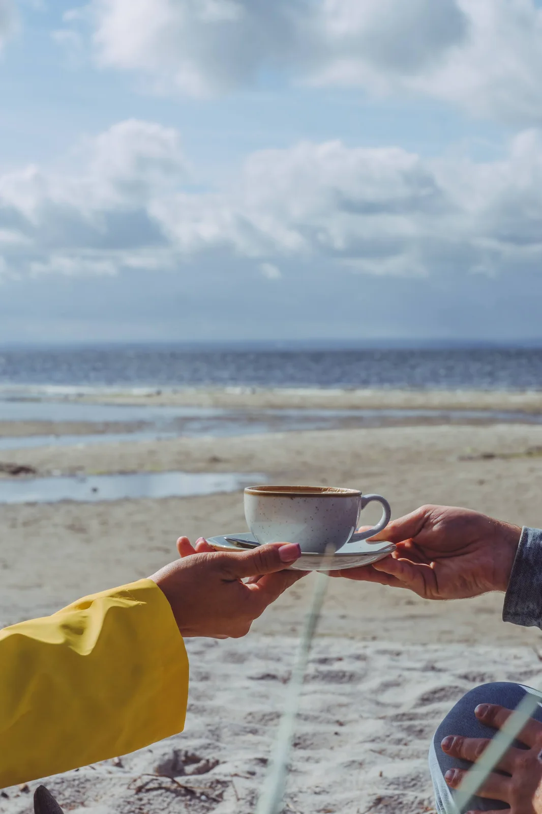 A cup of coffee by the sea